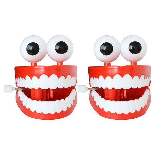 2 new strange toys with chain strap eyes and big white teeth