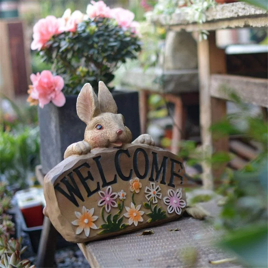 Raleigh Welcome Sign with Rabbit Garden Statue