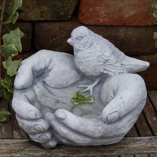 Madlyn Sparrow in the Hand Birdbath