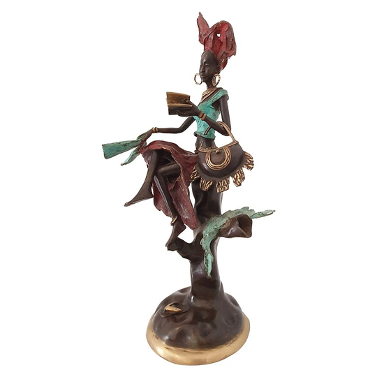 Copland Bronze Statue of an African Woman Perched on a Tree, Reading a Book